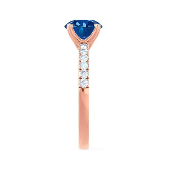 HYDRANGEA – Round Lab-Grown Blue Sapphire & Diamond Shoulder Set Ring in 18k Rose Gold